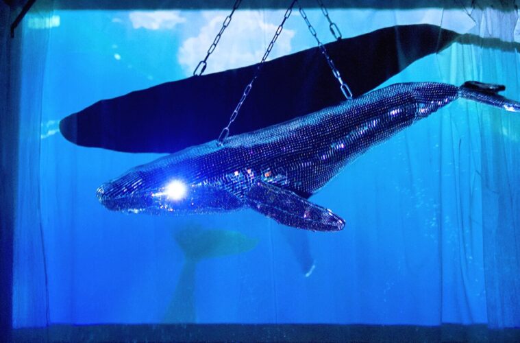mirrored whale sculpture